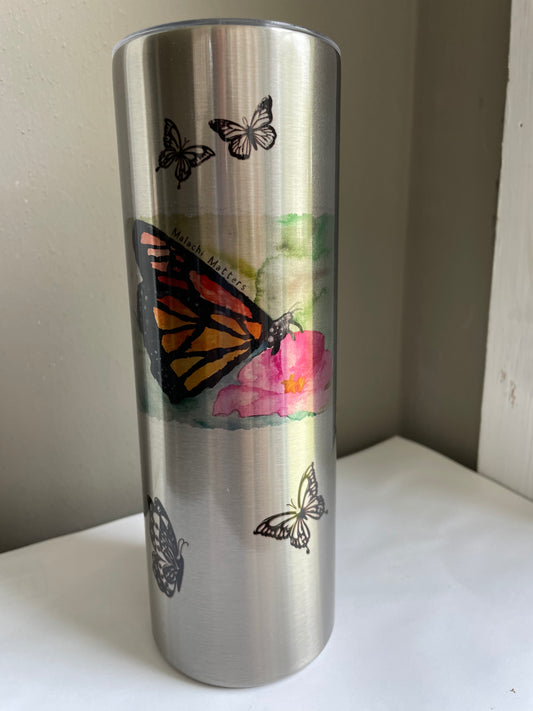 20oz stainless silver tumbler - Monarch. Few specks in coating.